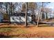 Charming home exterior featuring a well-maintained lawn and beautiful landscaping at 2107 Penrose Dr, Atlanta, GA 30344