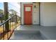 A close-up of the house's front door and porch, which features sleek black metal railings at 2107 Penrose Dr, Atlanta, GA 30344