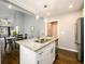 Gourmet island kitchen with modern finishes, granite countertops, and stainless appliances at 2107 Penrose Dr, Atlanta, GA 30344