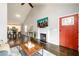 Bright living room features hardwood floors, fireplace, and an open floor plan at 2107 Penrose Dr, Atlanta, GA 30344