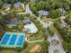 Aerial view of community amenities, homes, and lush green landscaping at 305 Inman Pl, Roswell, GA 30075
