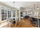 Sunny breakfast nook with views, open to the kitchen and living area at 305 Inman Pl, Roswell, GA 30075
