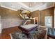 Spacious game room with pool table, hardwood flooring, and stairs to another level at 305 Inman Pl, Roswell, GA 30075