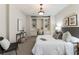 Charming main bedroom featuring an integrated work space with storage and a neutral color palette at 305 Inman Pl, Roswell, GA 30075