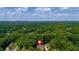 Overhead view of the property and surrounding lush landscape at 3819 Dora Se Dr, Smyrna, GA 30082
