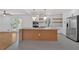 Open concept kitchen features a large island, stainless steel appliances, and natural light at 3819 Dora Se Dr, Smyrna, GA 30082