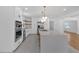 Bright kitchen with a large island, stainless steel appliances, white cabinets, and open layout at 3819 Dora Se Dr, Smyrna, GA 30082