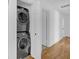 Conveniently located laundry closet with stacked washer and dryer units at 3819 Dora Se Dr, Smyrna, GA 30082