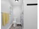 Clean bathroom with a tiled floor, a toilet, and a shower at 4495 Sagebrush Nw Dr, Kennesaw, GA 30152