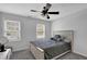 Cozy bedroom with a neutral color scheme, comfortable bed, and soft carpet at 4495 Sagebrush Nw Dr, Kennesaw, GA 30152