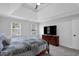 Bedroom featuring a bed and dresser with TV at 4495 Sagebrush Nw Dr, Kennesaw, GA 30152