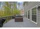Spacious outdoor deck perfect for entertaining, featuring seating, and outdoor grill, and scenic views at 4495 Sagebrush Nw Dr, Kennesaw, GA 30152