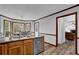 Kitchen area with stainless steel appliances, wood cabinets, and an eat-in breakfast nook at 4495 Sagebrush Nw Dr, Kennesaw, GA 30152