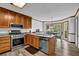 Kitchen showcasing stainless appliances, granite countertops, and a breakfast nook at 4495 Sagebrush Nw Dr, Kennesaw, GA 30152