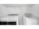 Clean laundry room with modern appliances and ample space at 4495 Sagebrush Nw Dr, Kennesaw, GA 30152