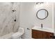 Modern bathroom featuring a sleek, updated vanity, shower with marble tiling, and contemporary fixtures at 478 Majestic Oaks Pl, Smyrna, GA 30082