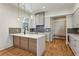 Bright, modern kitchen with island, stainless steel appliances, pendant lighting, and sleek cabinetry at 478 Majestic Oaks Pl, Smyrna, GA 30082