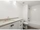 The updated bathroom features a subway tile shower and vanity with modern fixtures at 636 Ginger Cake Rd, Fayetteville, GA 30214