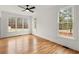 Bright bedroom with large windows providing lots of natural light and views of the wooded outdoors at 636 Ginger Cake Rd, Fayetteville, GA 30214
