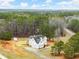 A charming two-story home features a manicured front yard and a classic architectural design at 636 Ginger Cake Rd, Fayetteville, GA 30214
