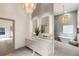 Luxury main bathroom features double vanity, soaking tub, and modern lighting at 1035 Walker Se Ave, Atlanta, GA 30316