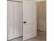 Hallway displaying sleek white doors with matte black hardware and modern design at 1035 Walker Se Ave, Atlanta, GA 30316