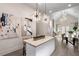 Spacious living room featuring an open floor plan, modern lighting, and neutral decor at 1035 Walker Se Ave, Atlanta, GA 30316