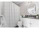 Bathroom with a white vanity with dark countertops and a white shower curtain at 1088 Riverbend Club Se Dr, Atlanta, GA 30339