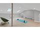 Bright bonus room with skylights, and light wood flooring, perfect for a home gym or studio at 1088 Riverbend Club Se Dr, Atlanta, GA 30339