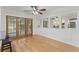 Bright dining room with bamboo floors and a view into the kitchen at 1088 Riverbend Club Se Dr, Atlanta, GA 30339