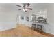Open dining space features bamboo floors, bar seating, and access to the kitchen at 1088 Riverbend Club Se Dr, Atlanta, GA 30339