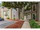 Inviting townhome with beautiful landscaping, private entrance, and dedicated parking space at 1088 Riverbend Club Se Dr, Atlanta, GA 30339