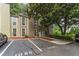 Charming townhome featuring a welcoming entrance, well-maintained landscaping, and convenient parking at 1088 Riverbend Club Se Dr, Atlanta, GA 30339