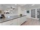 Spacious kitchen island with seating and modern countertop finish at 1088 Riverbend Club Se Dr, Atlanta, GA 30339