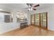 Open dining area with a view to the kitchen and french doors at 1088 Riverbend Club Se Dr, Atlanta, GA 30339