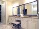 Vanity with granite countertops, dual sinks, and three large mirrors at 118 Cedarcrest Village Ct, Acworth, GA 30101