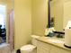 Full bathroom with toilet, granite countertop, and a decorative mirror at 118 Cedarcrest Village Ct, Acworth, GA 30101
