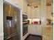 Gourmet kitchen with stainless steel appliances, white cabinetry, and granite countertops at 118 Cedarcrest Village Ct, Acworth, GA 30101
