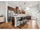 Modern kitchen features a spacious island, stainless steel appliances, and stylish pendant lighting at 2018 Manchester Ne St, Atlanta, GA 30324