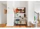 Bright entry featuring modern decor, hardwood floors, and artwork; blends style with practical storage at 2018 Manchester Ne St, Atlanta, GA 30324