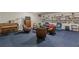 Spacious clubhouse featuring comfortable seating, a piano, and a well-stocked bookshelf, perfect for socializing at 2965 Pharr Court South Nw # 518, Atlanta, GA 30305
