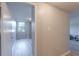 Inviting hallway leading to a bright room with new floors and natural light at 2965 Pharr Court South Nw # 518, Atlanta, GA 30305
