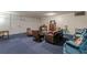 Relaxing living room with comfortable leather chairs and sofa around coffee table at 2965 Pharr Court South Nw # 518, Atlanta, GA 30305
