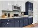 Kitchen boasting granite countertops, stainless steel appliances, and custom cabinetry at 269 Hidden Wood Ct, Lawrenceville, GA 30043