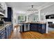 Kitchen with granite counters, stainless appliances, and a view into the living room at 269 Hidden Wood Ct, Lawrenceville, GA 30043