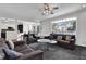 The open living room offers generous seating and connects to the kitchen for easy entertaining at 269 Hidden Wood Ct, Lawrenceville, GA 30043
