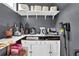 Pantry with a multitude of kitchen appliances and ample shelving at 269 Hidden Wood Ct, Lawrenceville, GA 30043