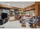 A comfortable living room area features a stone wall and ample entertainment space at 1050 E Club Ne Ln, Atlanta, GA 30319
