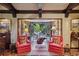 Living room featuring french doors to the outside and matching arm chairs at 1050 E Club Ne Ln, Atlanta, GA 30319