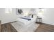 Bedroom with neutral decor, natural light, and laminate wood flooring at 2299 Brenda Se Dr, Smyrna, GA 30080